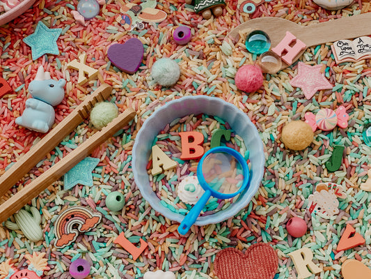 Rainbow alphabet soup sensory bin